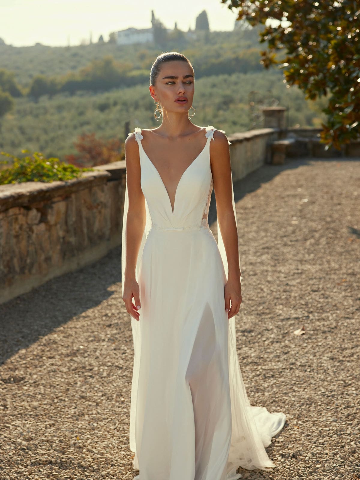 Das Brautkleid Dina vom Hersteller Modeca, bei Ivory & Blush